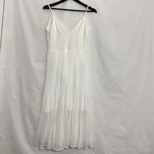 Never used. Bone color ballerina style dress. Body suit underneath. Size M